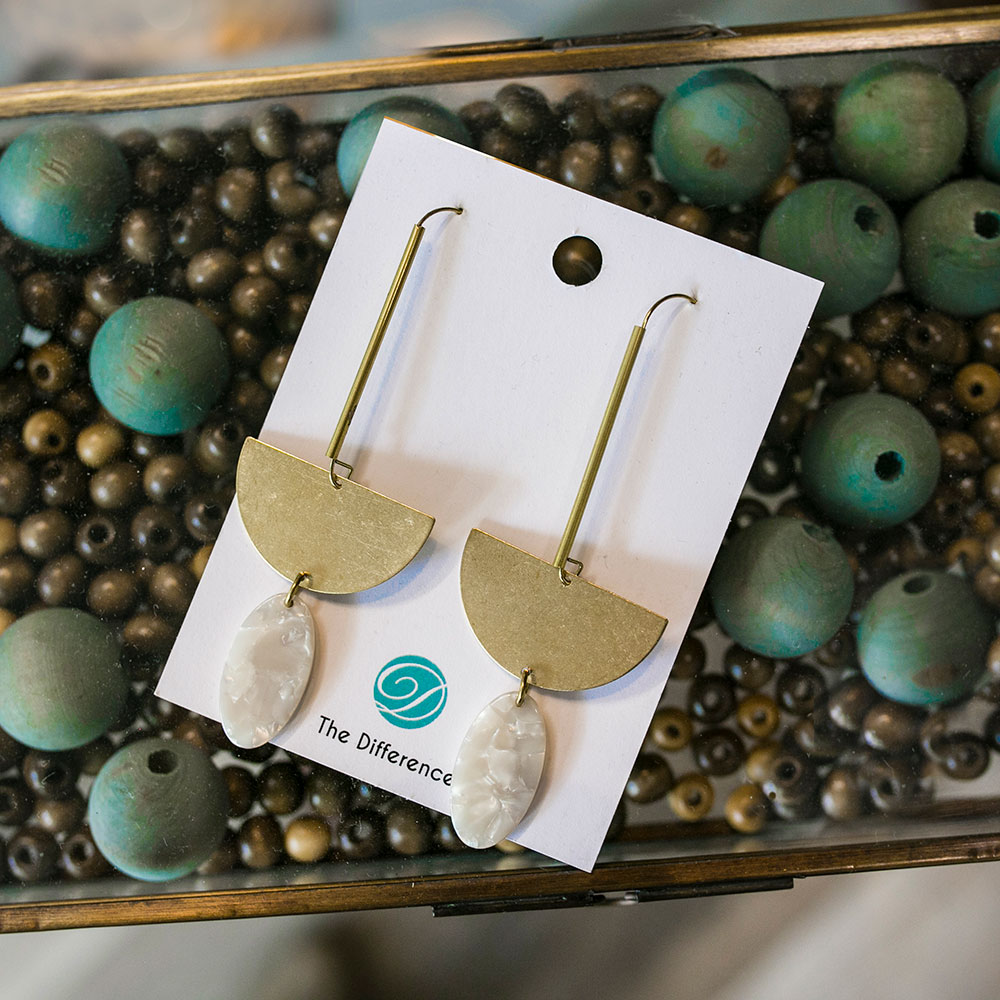 Earrings on display at The Difference Women's Clothing Boutique
